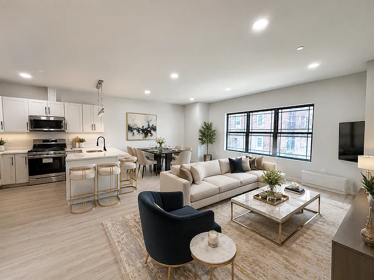 Open kitchen and living area in the Van Houten Street residential project. Open kitchen and living area in the Van Houten Street residential project.